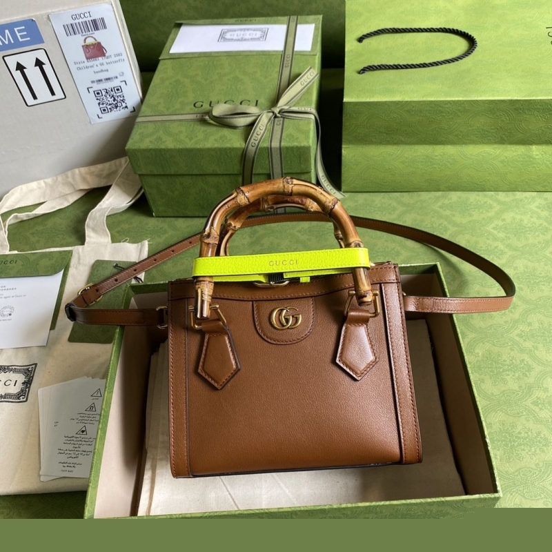 G*u*i top handle bags